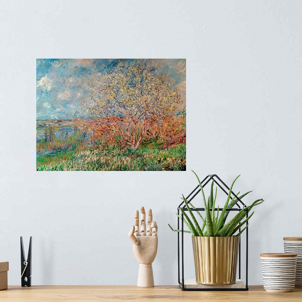 A bohemian room featuring An Impressionist landscape painting of a small tree growing on a hill overlooking a valley.