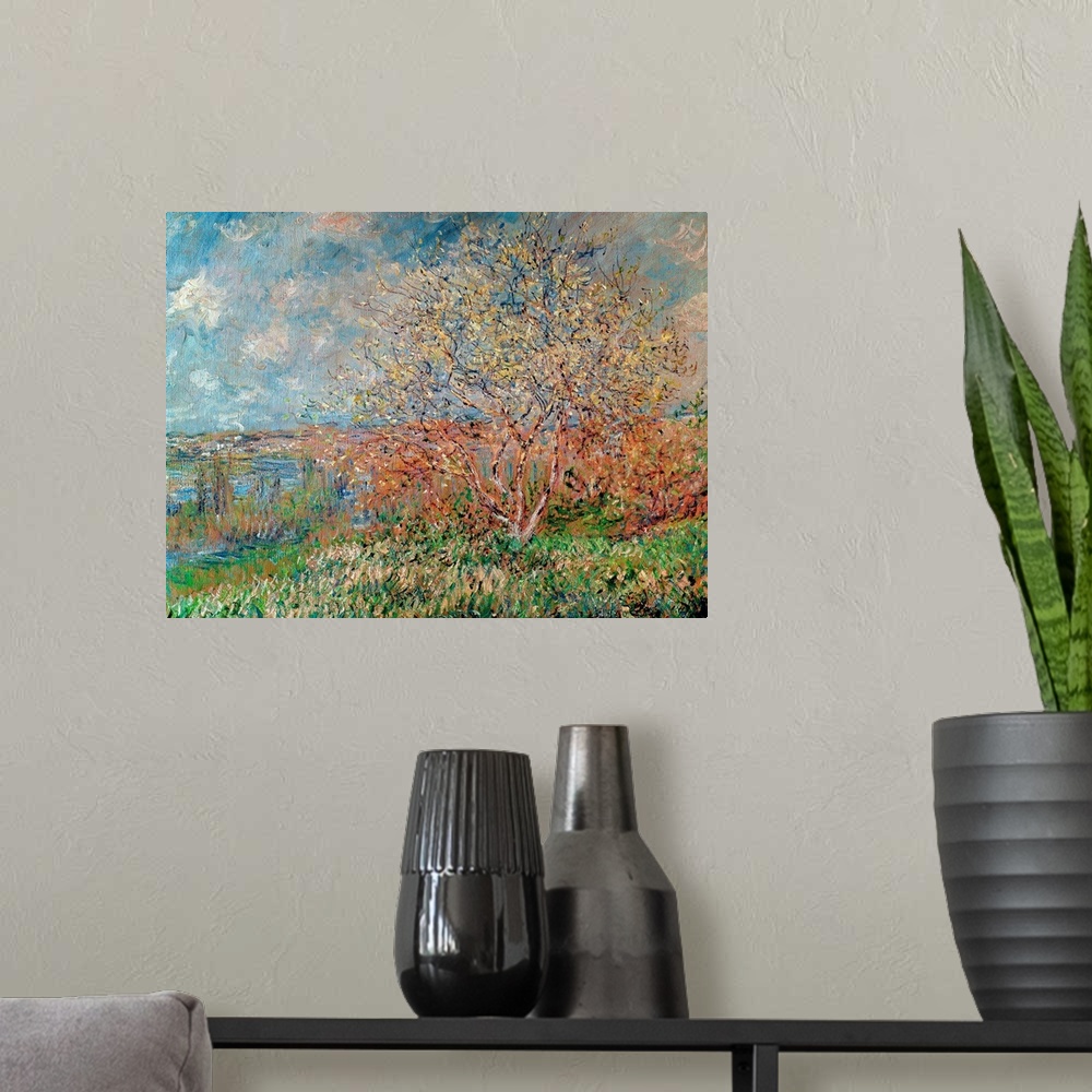 A modern room featuring An Impressionist landscape painting of a small tree growing on a hill overlooking a valley.