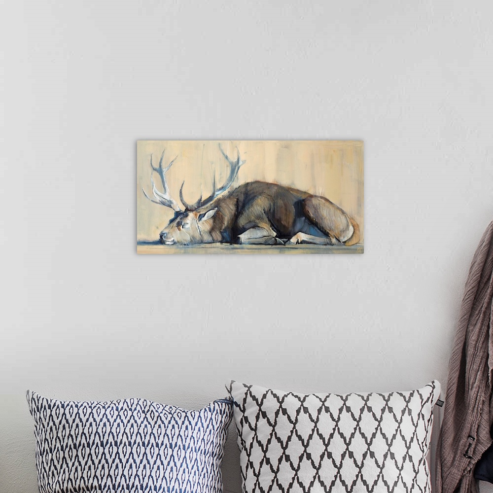 A bohemian room featuring Contemporary artwork of a stag against an earthy background.