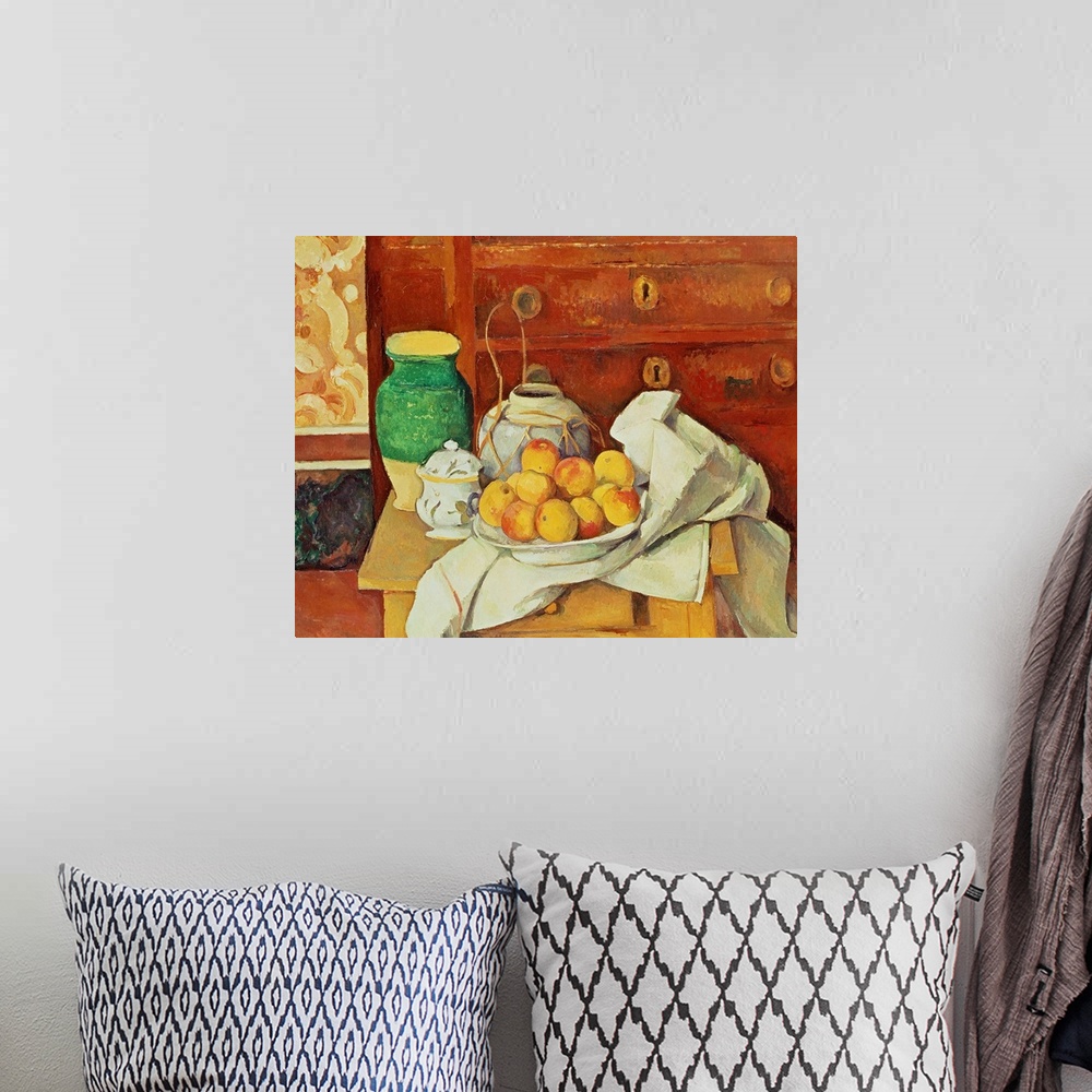 A bohemian room featuring Painting of fruit in a bowl and vases on a table with a painted canvas and dresser in the backgro...