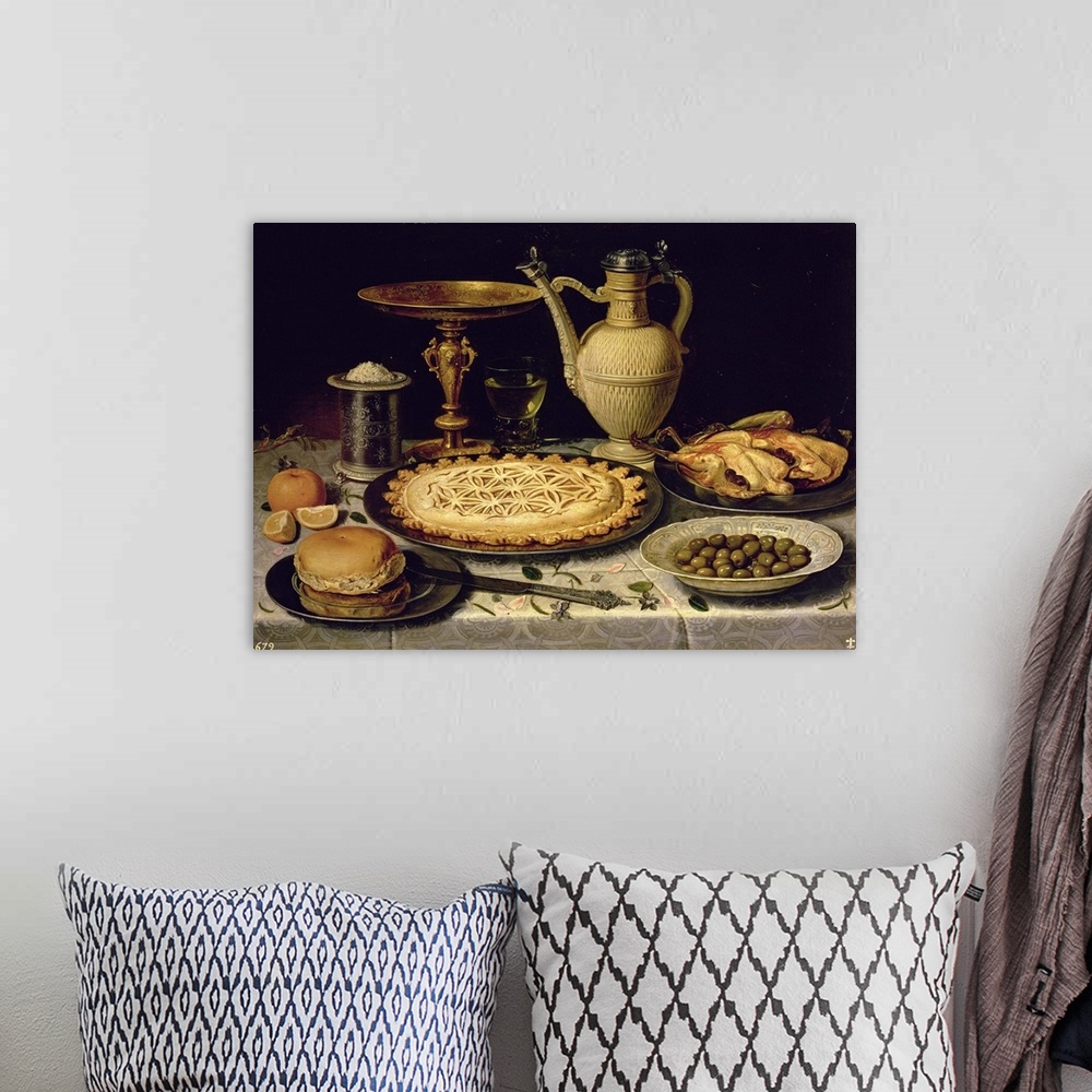 A bohemian room featuring Still life with a tart, roast chicken, bread, rice and olives