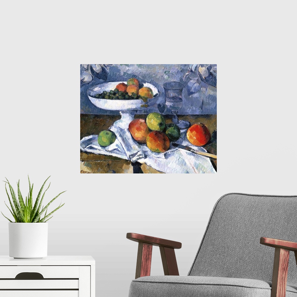 A modern room featuring Still Life with Fruit Dish, 1879-80, oil on canvas.  By Paul Cezanne (1839-1906).