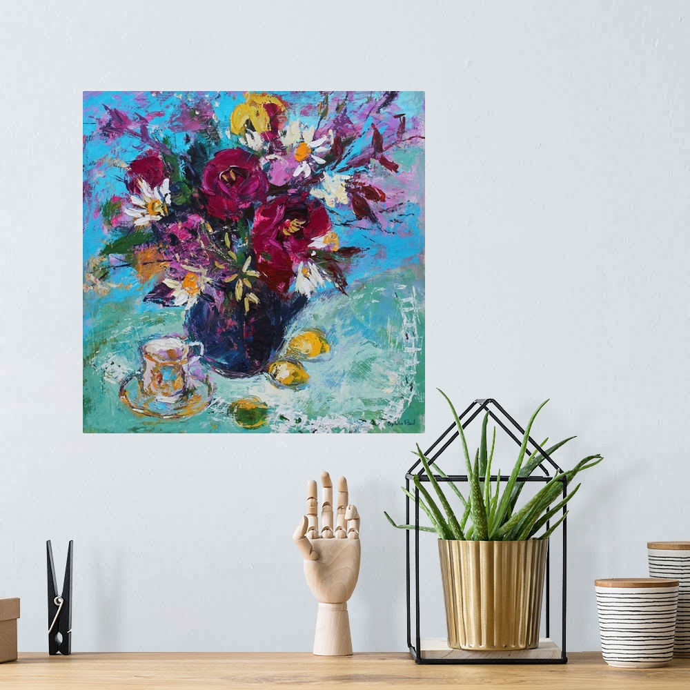 A bohemian room featuring Contemporary still-life painting of flowers in a vase.