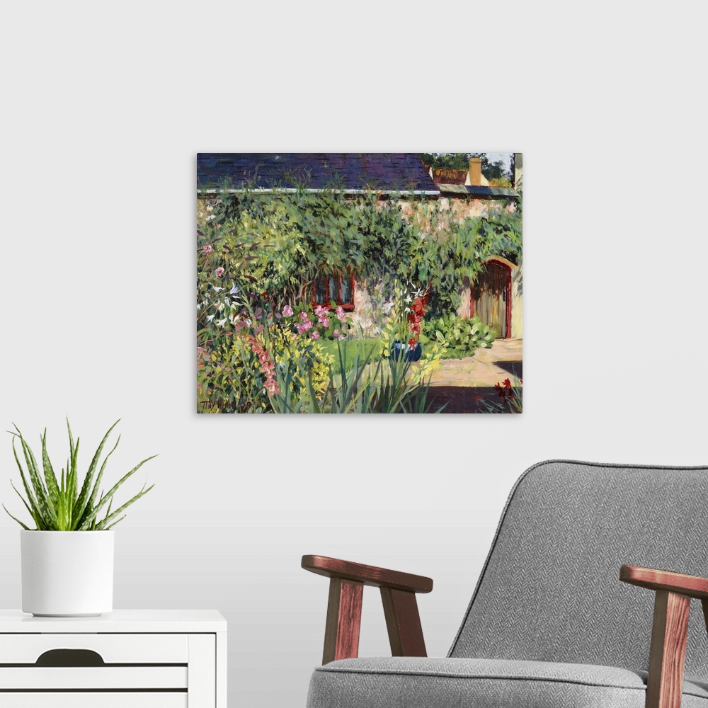 A modern room featuring Horizontal painting on a big wall hanging of a lush garden full of numerous flowers and foliage, ...