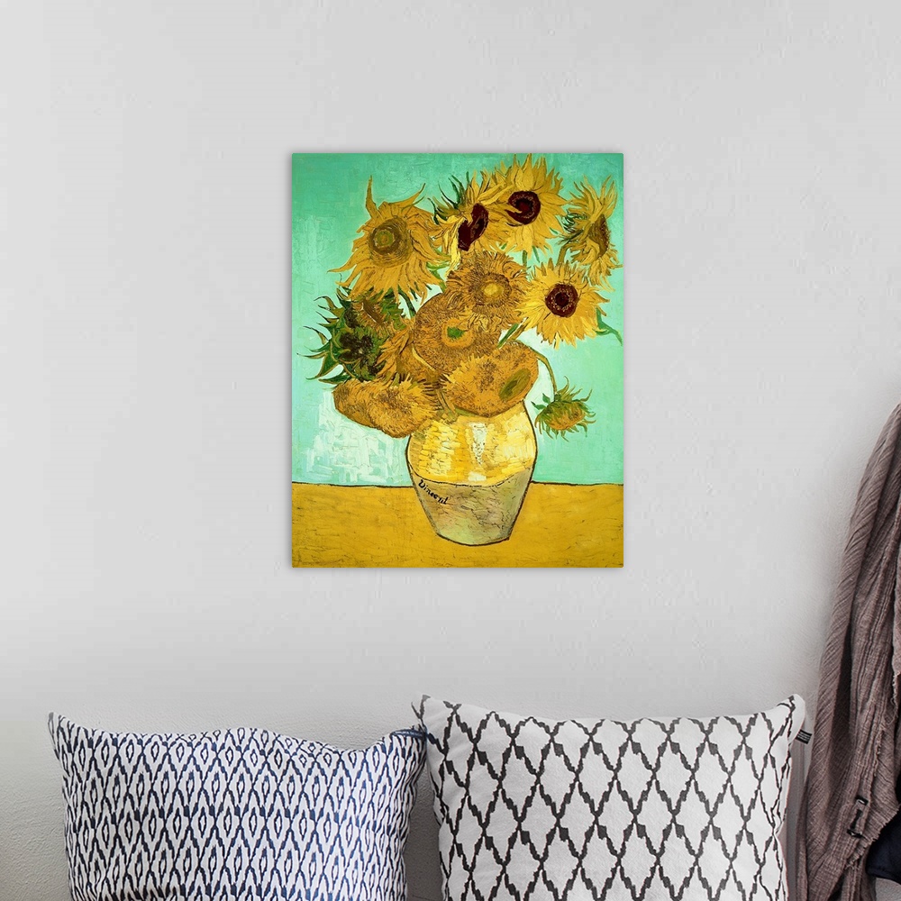 A bohemian room featuring Classic oil painting of warm colored sunflowers in a vase with a cool toned background.