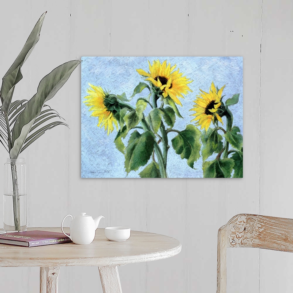 A farmhouse room featuring Contemporary painting of three large sunflowers.