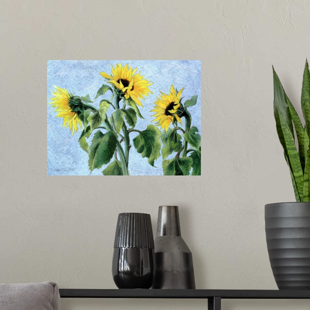 A modern room featuring Contemporary painting of three large sunflowers.