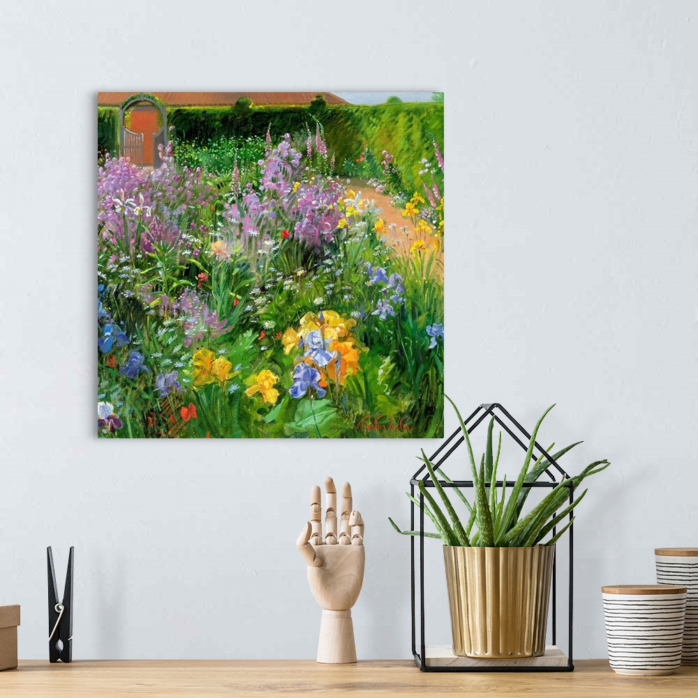 A bohemian room featuring Square painting of different types and colors of flowers planted in a garden.