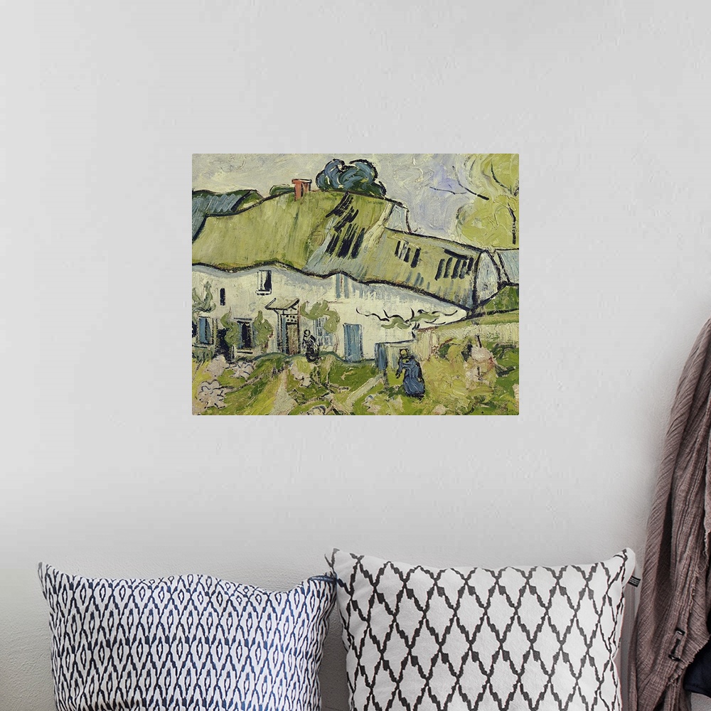 A bohemian room featuring Oil painting of farmhouse with field in front that has people tending to crops.