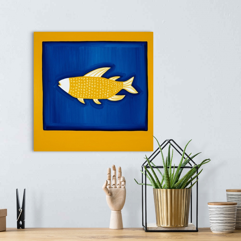 A bohemian room featuring Contemporary painting of a yellow fish on a blue background.