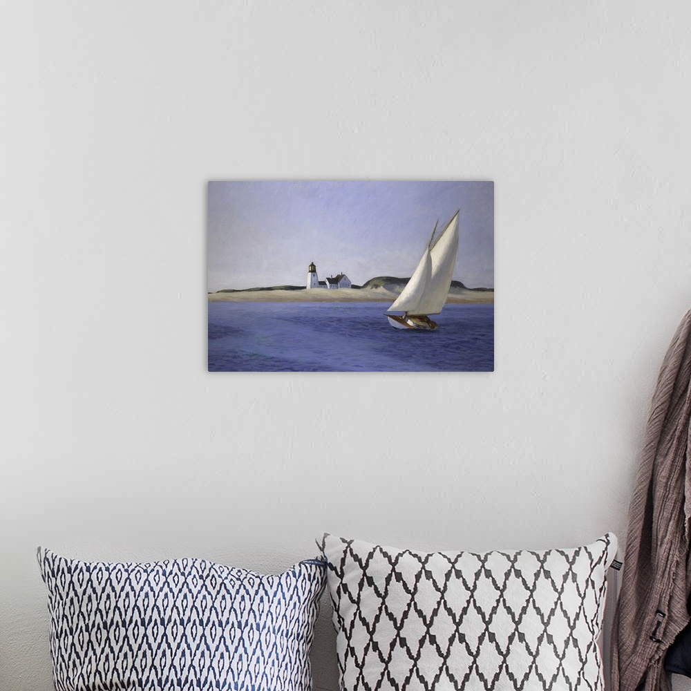 A bohemian room featuring Classic art painting of a sailboat moving gracefully across the water on the New England shore wi...