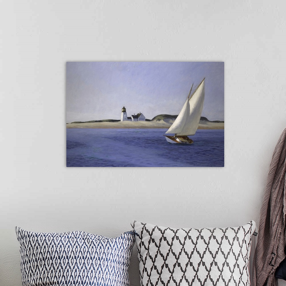 A bohemian room featuring Classic art painting of a sailboat moving gracefully across the water on the New England shore wi...