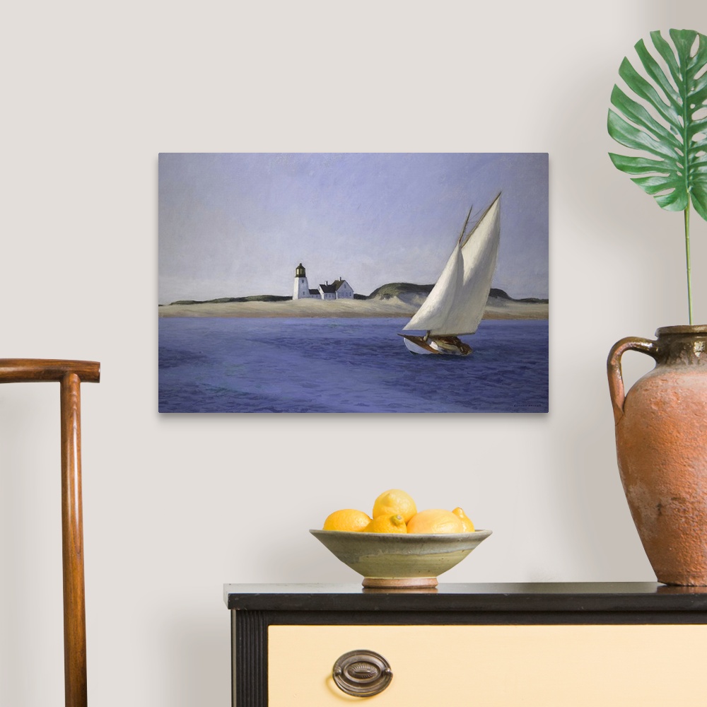 A traditional room featuring Classic art painting of a sailboat moving gracefully across the water on the New England shore wi...