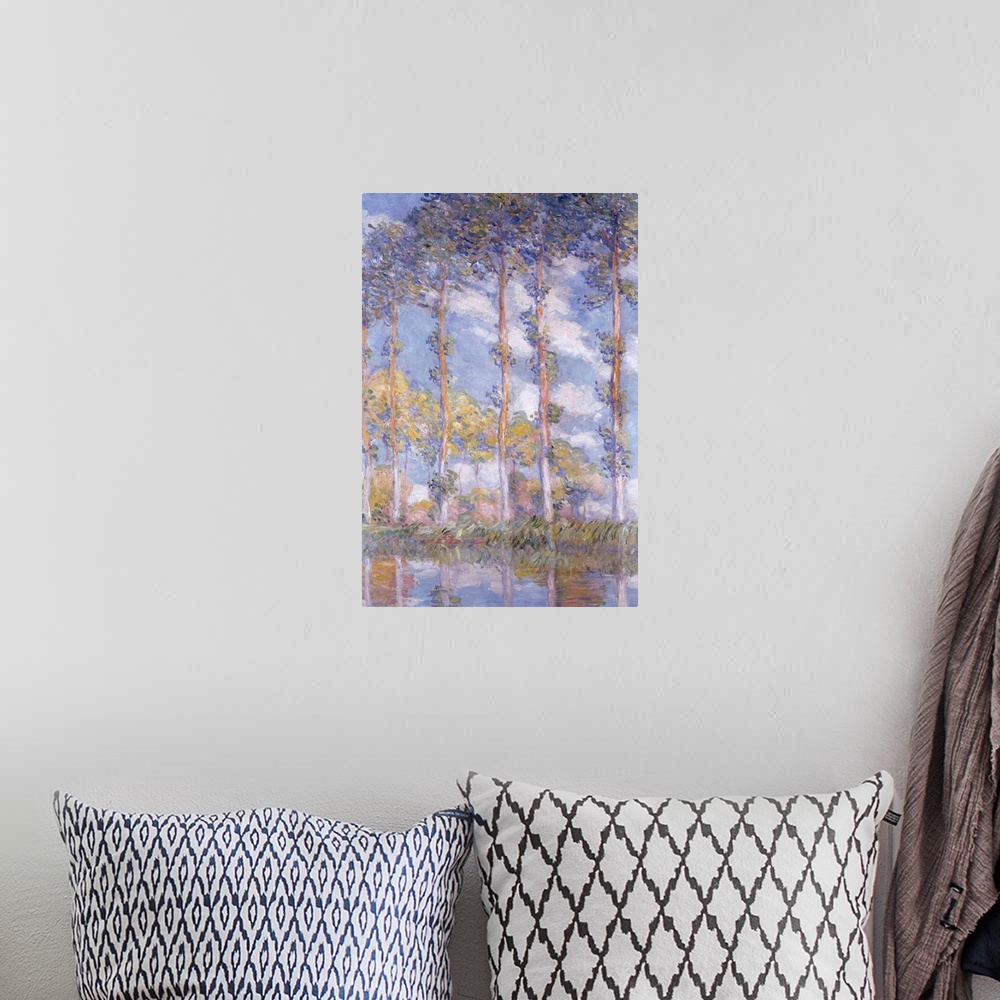 A bohemian room featuring Big, vertical classic painting of a line of tall Poplar trees in front of a blue sky, reflecting ...