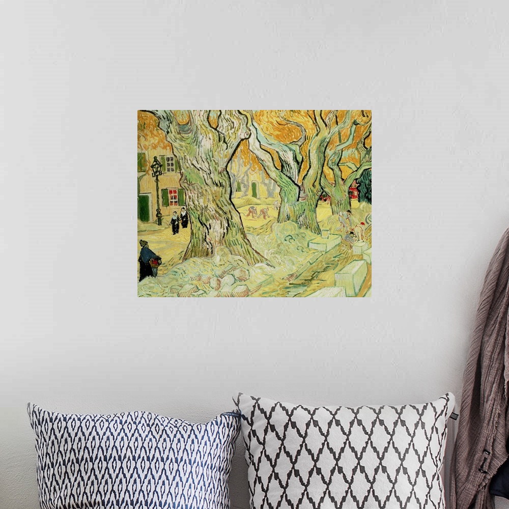 A bohemian room featuring Large trees line the middle of this print with houses and a street just to the left where people ...