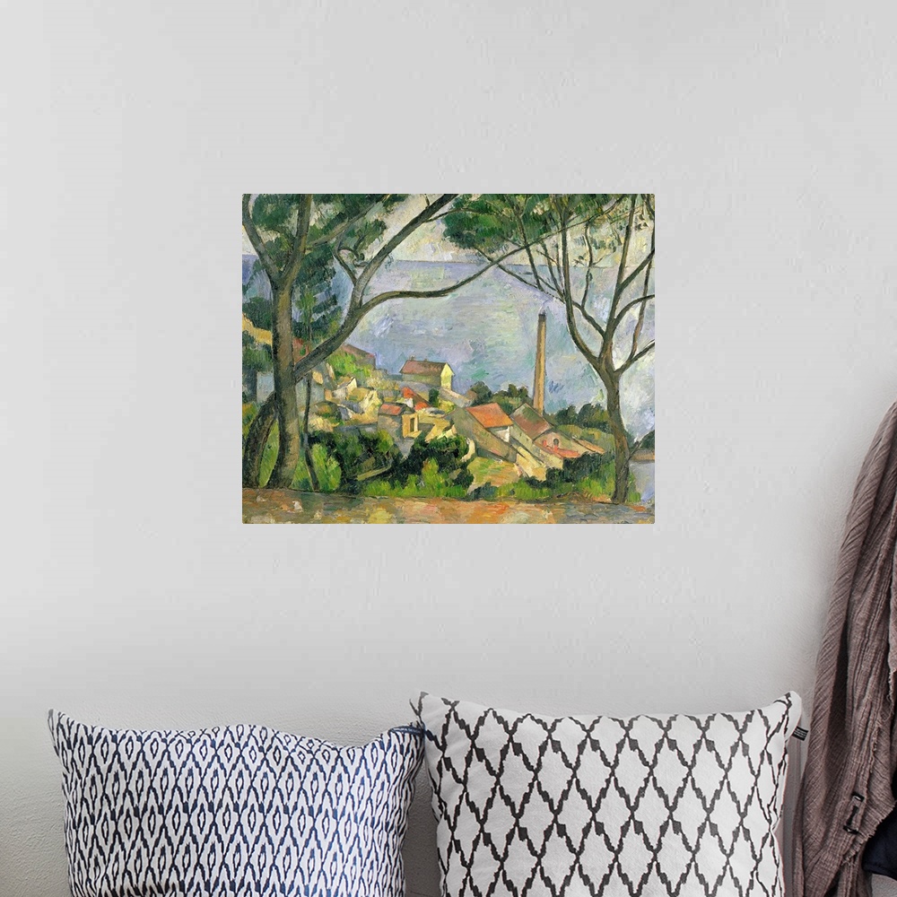 A bohemian room featuring Painting by Paul Cezanne of a picturesque seaside town with two trees in the foreground on a hill...