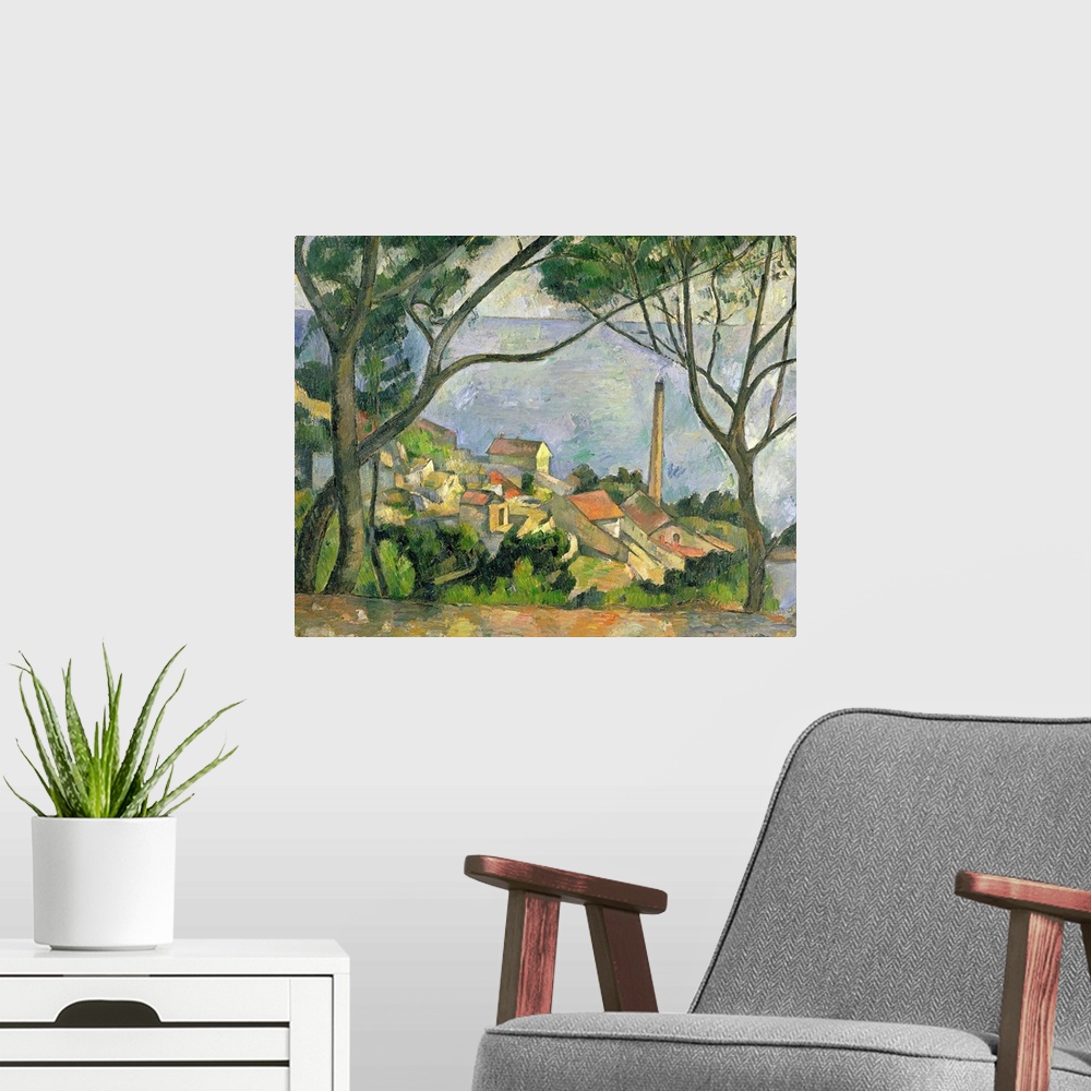 A modern room featuring Painting by Paul Cezanne of a picturesque seaside town with two trees in the foreground on a hill...