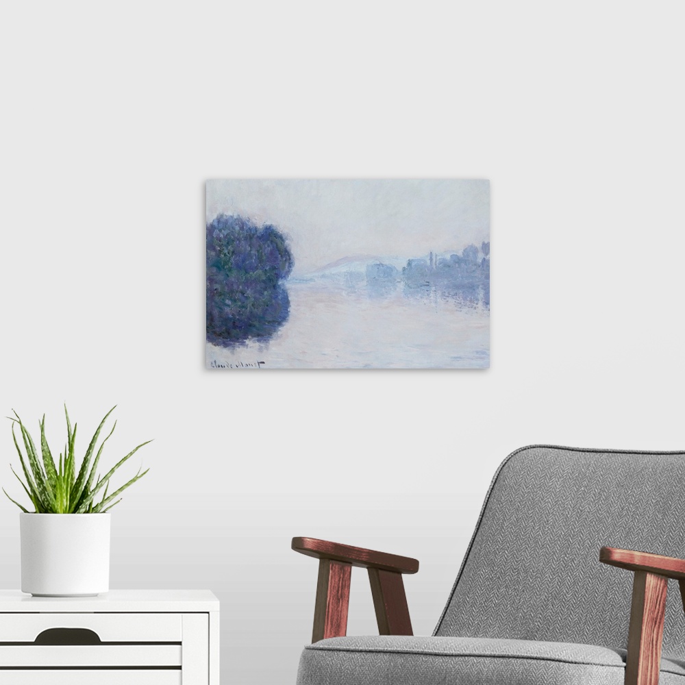 A modern room featuring Horizontal, classic art painting of trees surrounding a body of water, a dense fog makes those in...