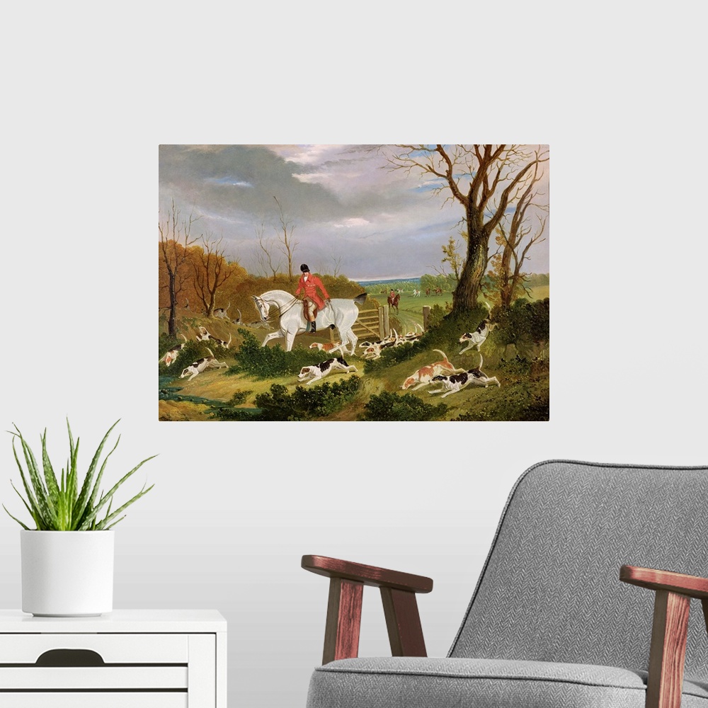 A modern room featuring XYC158549 The Suffolk Hunt - Going to Cover near Herringswell (oil on canvas) by Herring Snr, Joh...