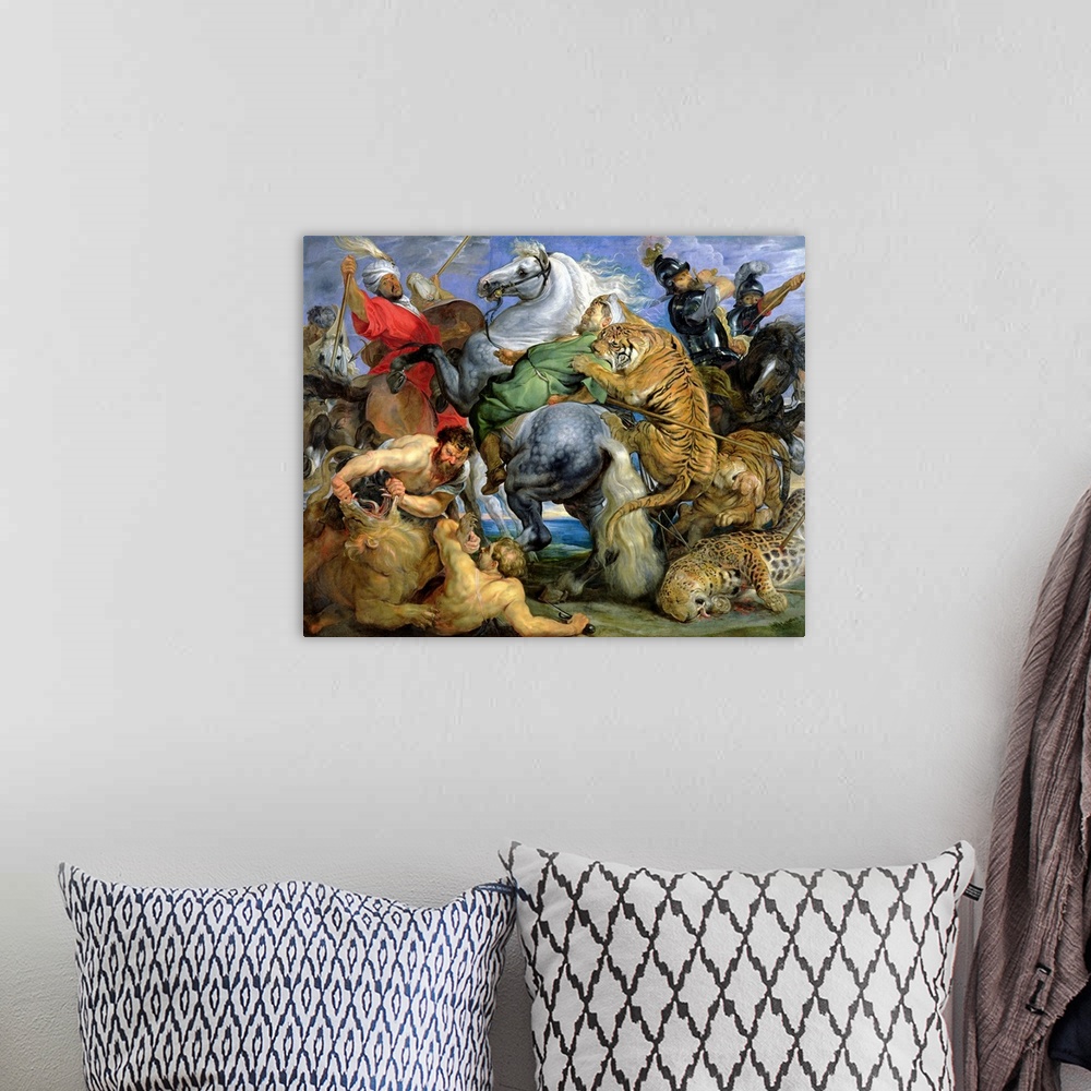 A bohemian room featuring Oil painting of horsemen and wildcats fighting.  One man is wrestling a lion on the ground while ...