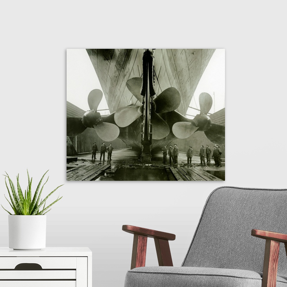 A modern room featuring The Titanic's propellers in the Thompson Graving Dock of Harland
