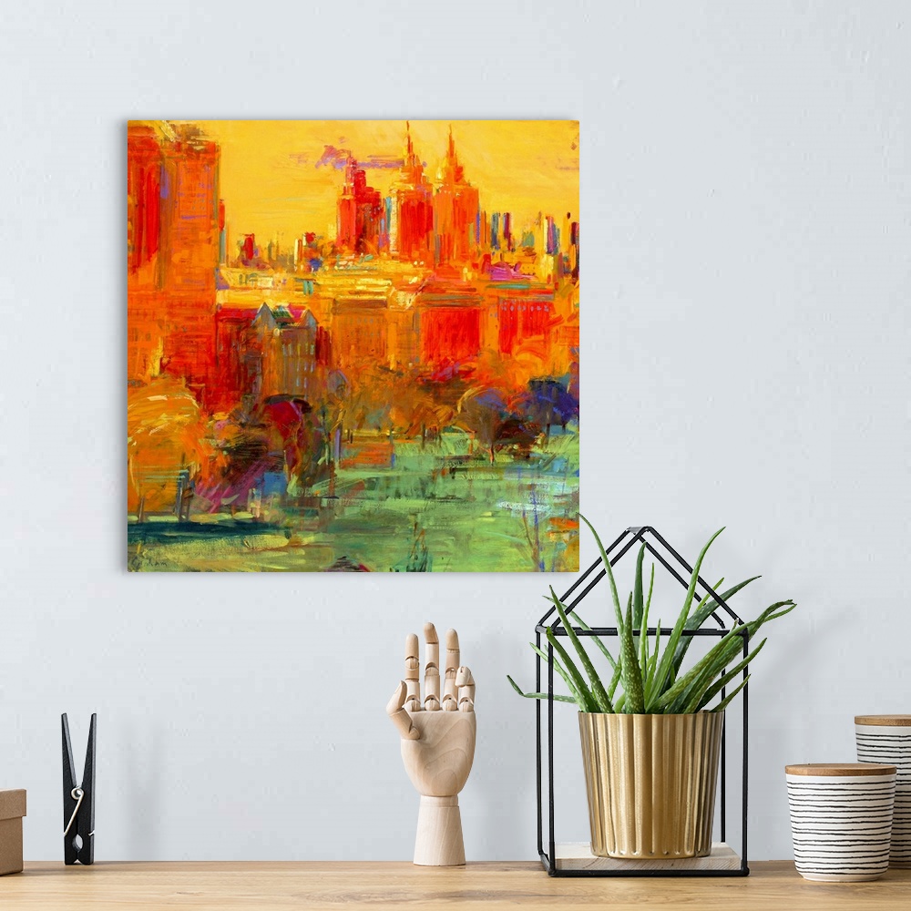 A bohemian room featuring An oil painting that uses bright colors to paint part of the NYC skyline. The bottom of the print...
