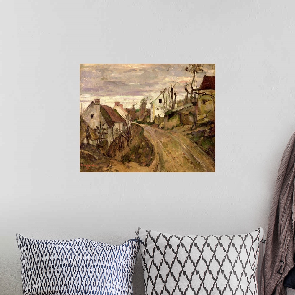 A bohemian room featuring Painting of a dirt road going through a small country town with houses on either side.