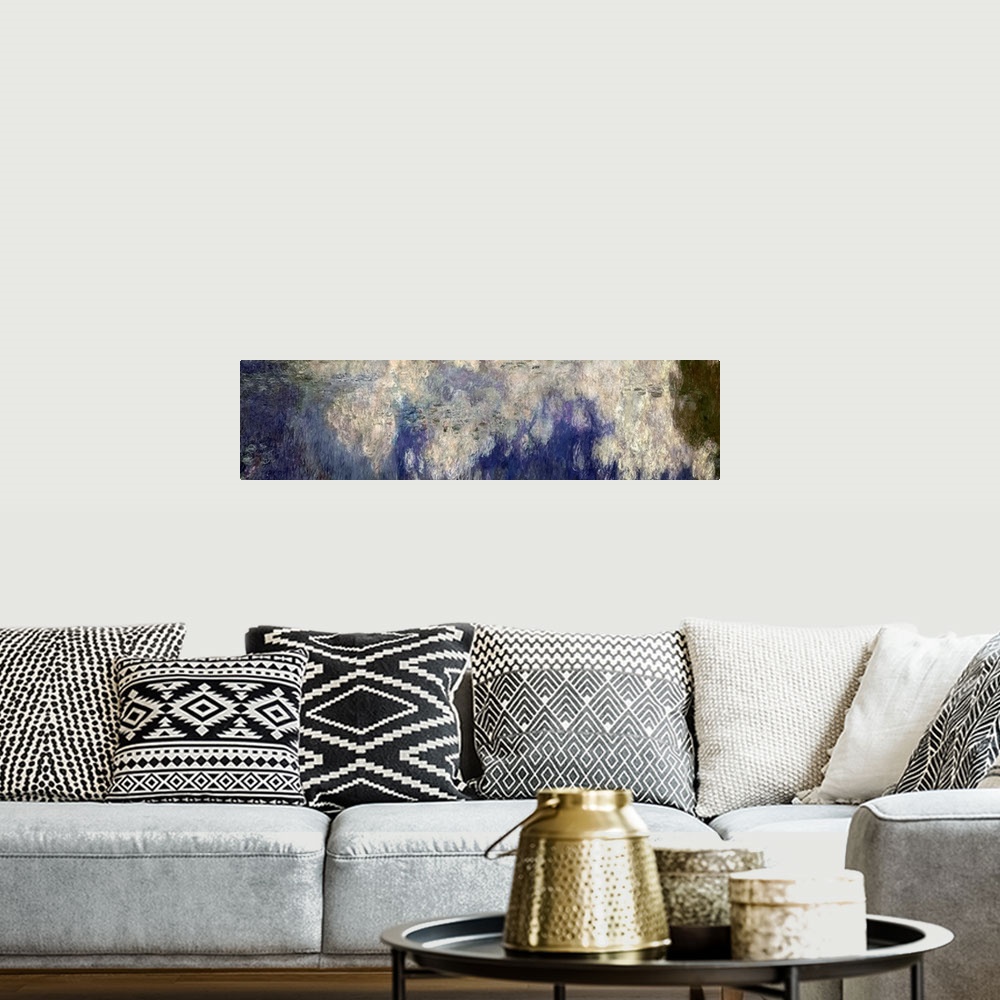 A bohemian room featuring Long panoramic of a classical impressionist painting of clouds and trees reflecting  from the wat...