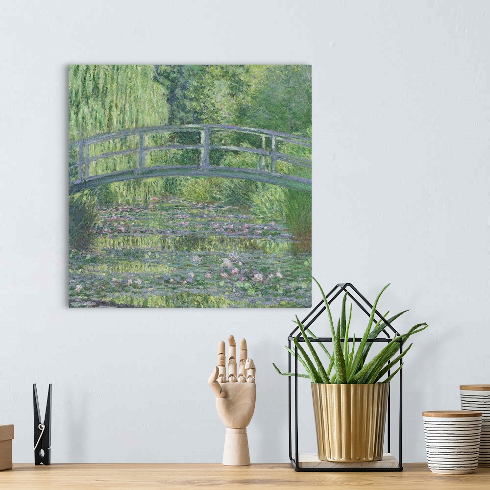A bohemian room featuring Square shaped artwork of a detail of an Impressionist painting from Giverny showing an arched bri...
