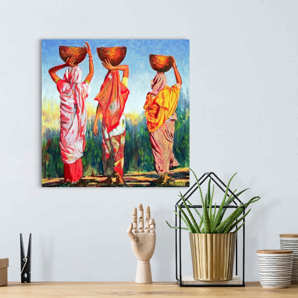 A bohemian room featuring Oil painting on canvas of three women carrying bowls on their heads walking towards a tall field.