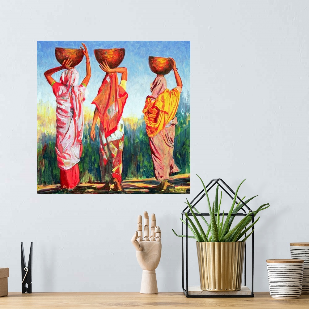 A bohemian room featuring Oil painting on canvas of three women carrying bowls on their heads walking towards a tall field.