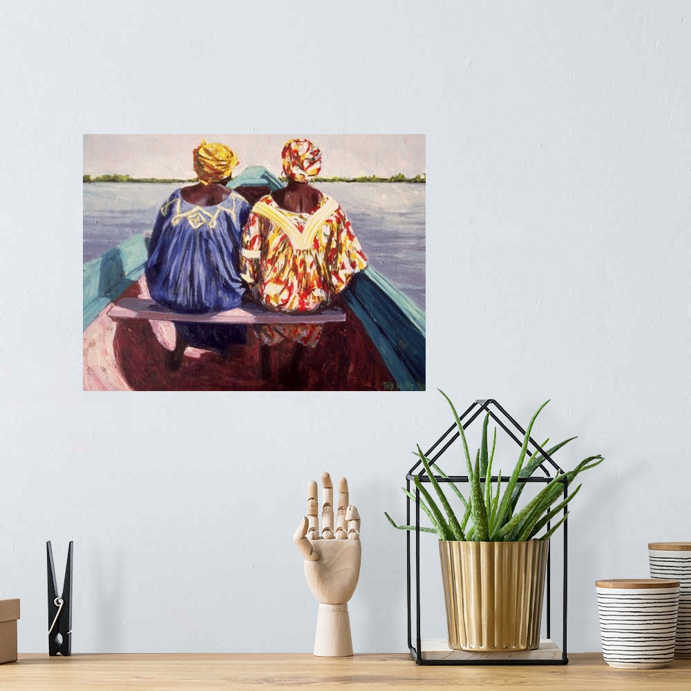 A bohemian room featuring Painting of two African woman sitting next to each other on a canoe style blue boat in the water ...