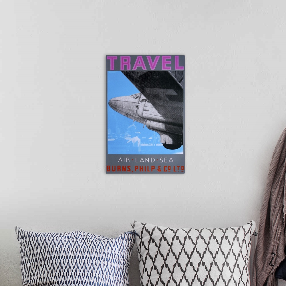 A bohemian room featuring Contemporary artwork of an air travel poster.