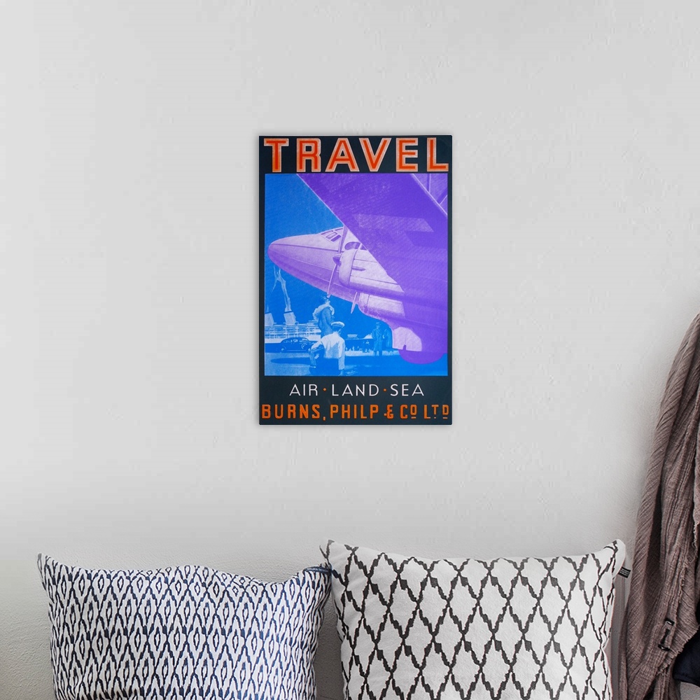 A bohemian room featuring Contemporary artwork of a travel poster for Air Travel.