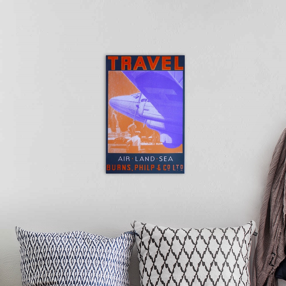 A bohemian room featuring Contemporary artwork of a travel poster for Air Travel.