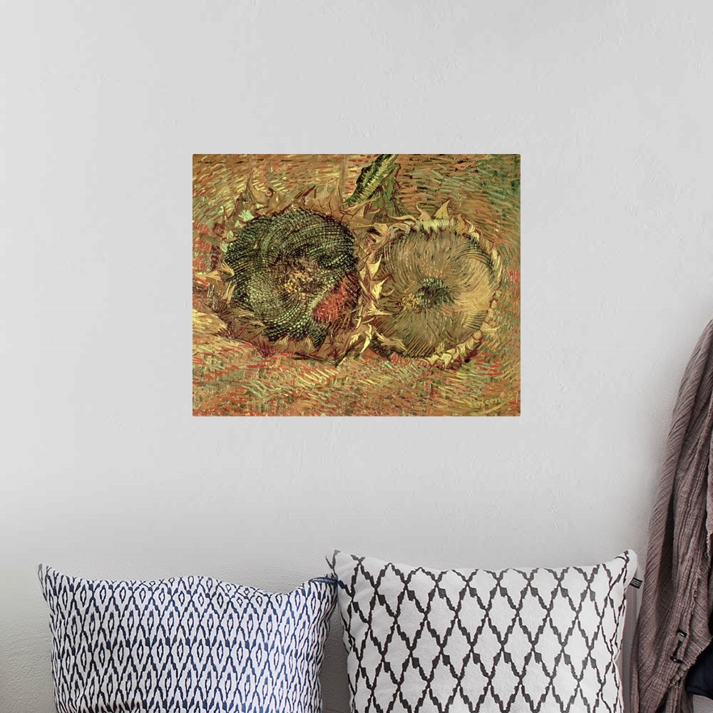 A bohemian room featuring A piece of classic artwork that has two drawn sunflower heads that lay on the ground.