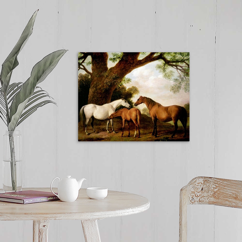 A farmhouse room featuring Giant classic art focuses on three horses standing beneath a very large tree on the edge of a for...