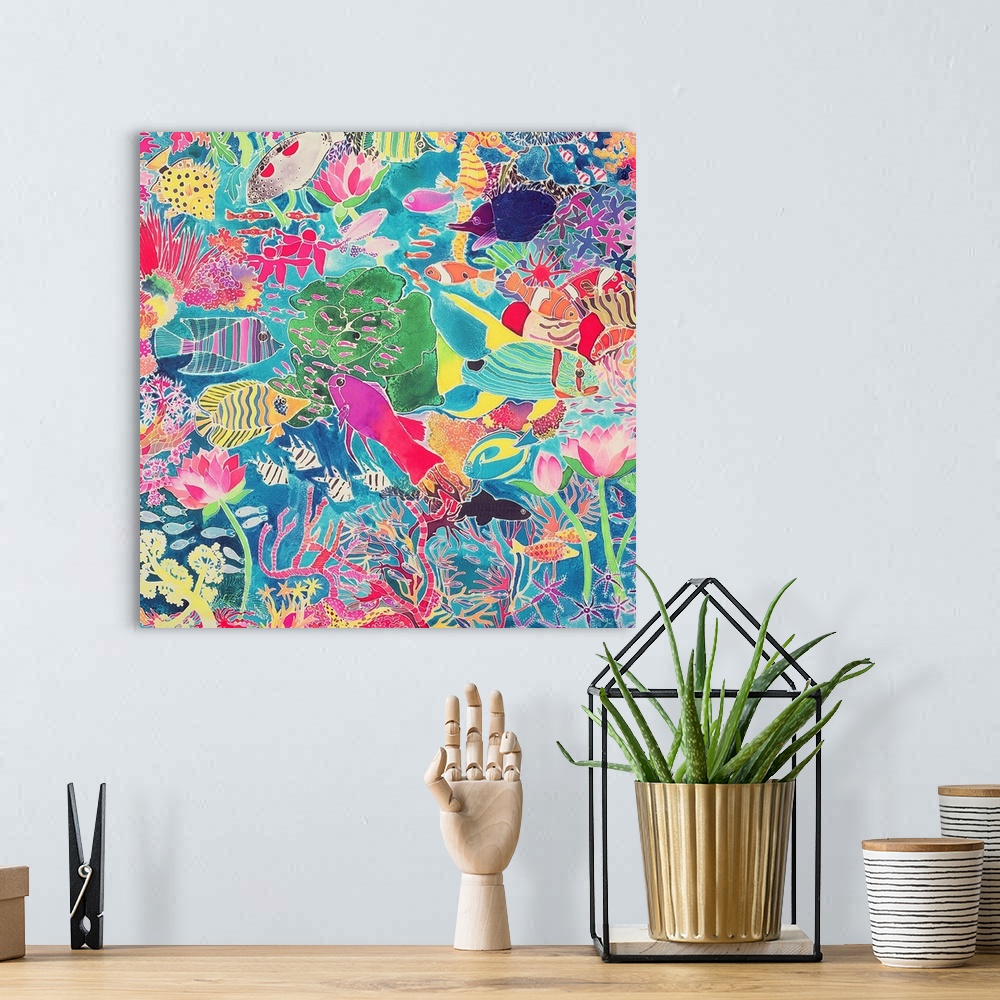 A bohemian room featuring Contemporary painting of several tropical fish in a coral reef.