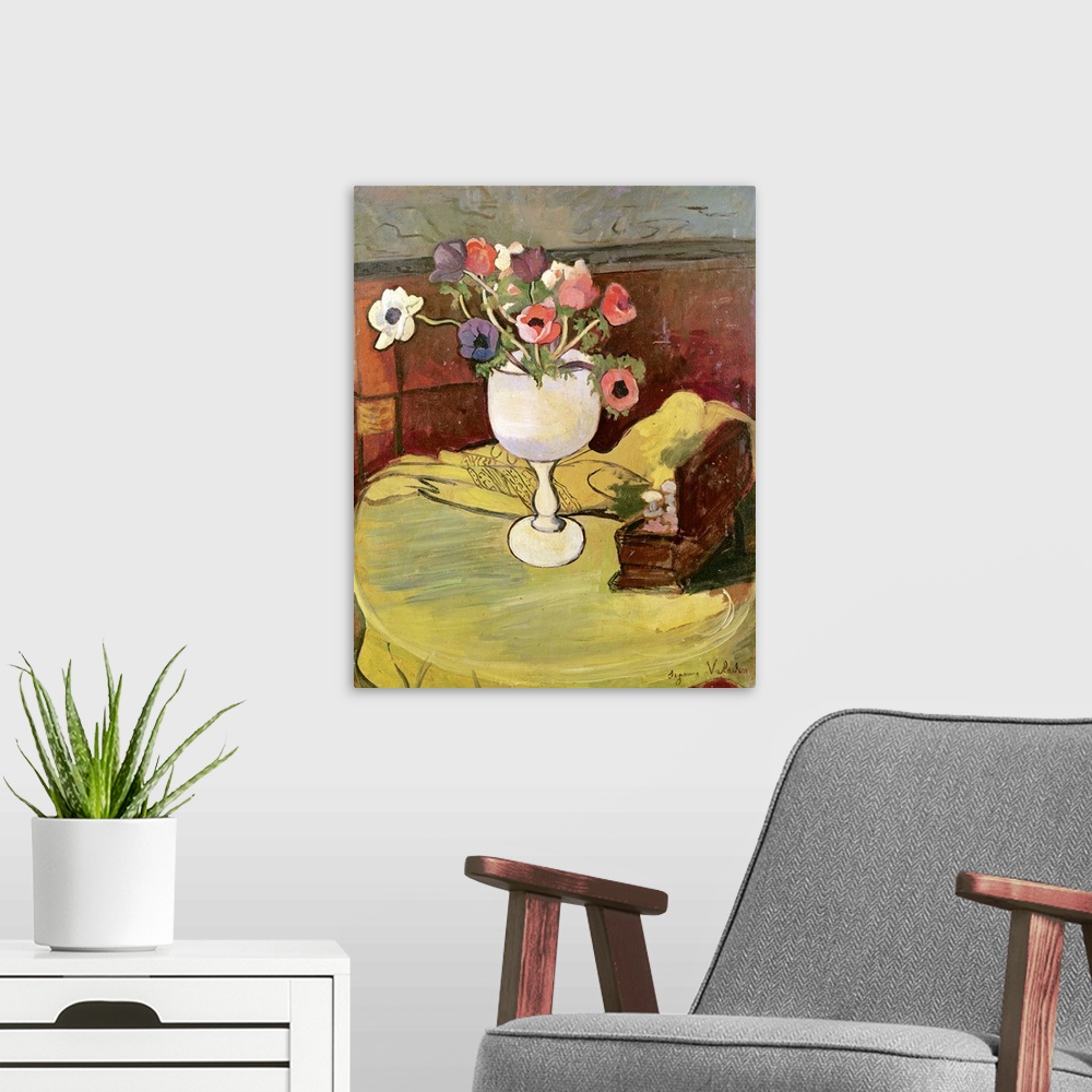 A modern room featuring XIR205436 Vase of Flowers, Anemones in a White Glass (oil on canvas)  by Valadon, Marie Clementin...