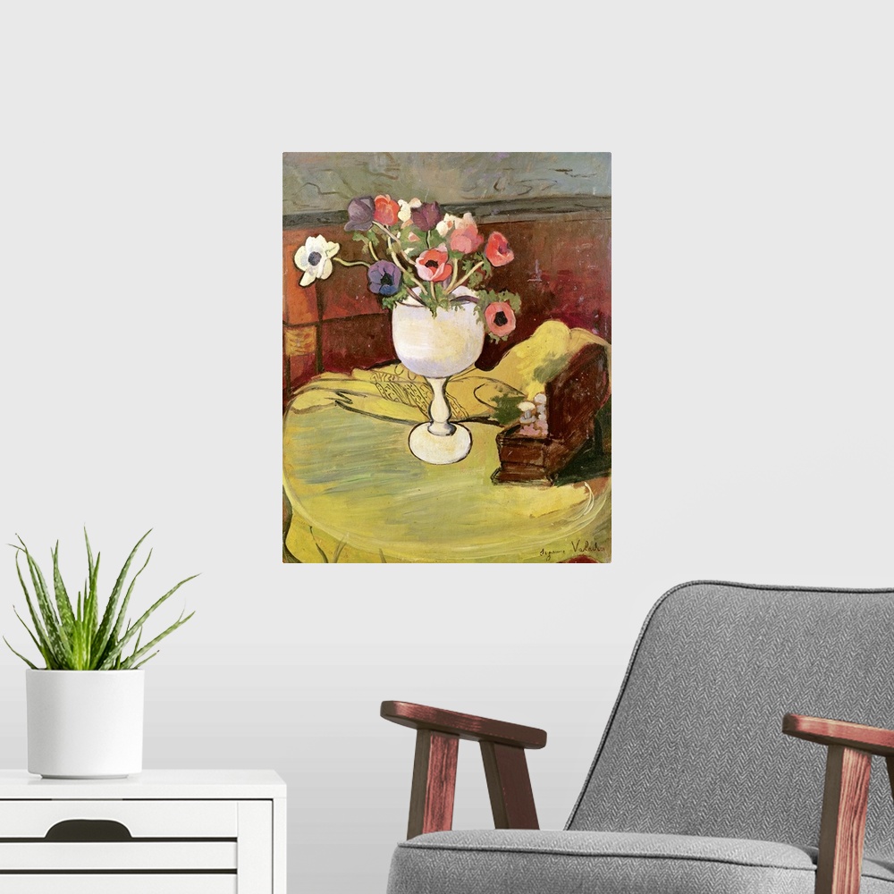 A modern room featuring XIR205436 Vase of Flowers, Anemones in a White Glass (oil on canvas)  by Valadon, Marie Clementin...