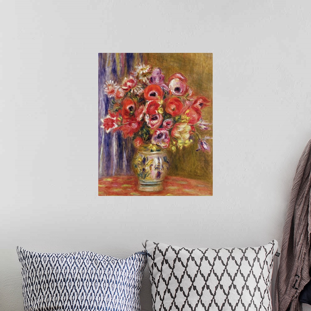 A bohemian room featuring Big painting on canvas of large flowers in a vase on a table.