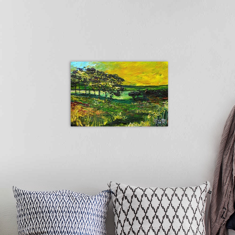 A bohemian room featuring Contemporary painting of a scenic countryside landscape.