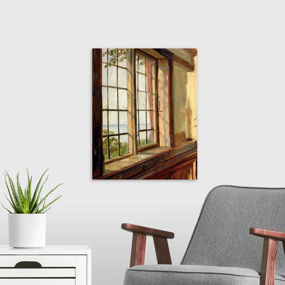 A modern room featuring Blick durch ein Fenster auf die Elbe;