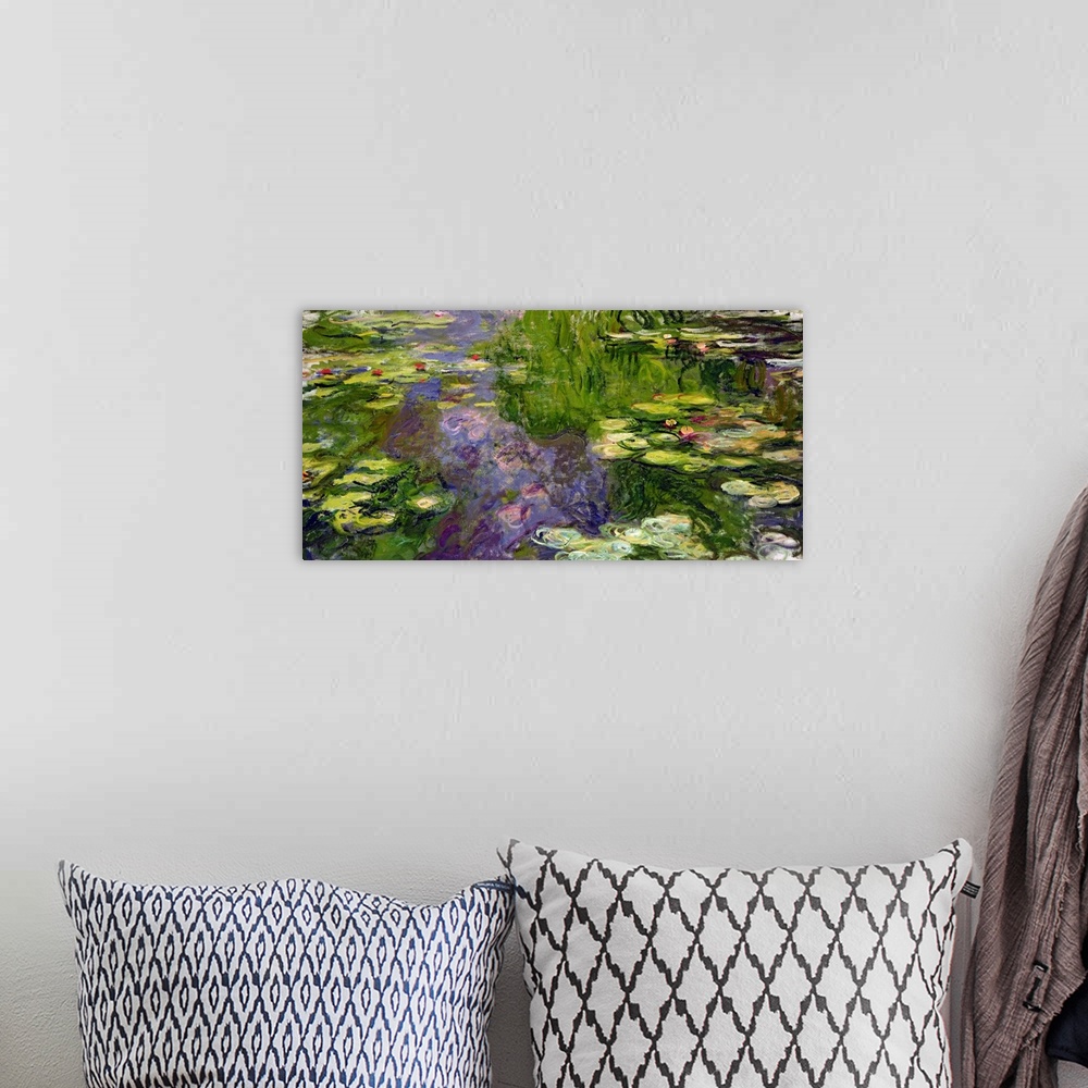 A bohemian room featuring Large classic oil on canvas painting of water lilies.  The texture of the brush strokes give this...