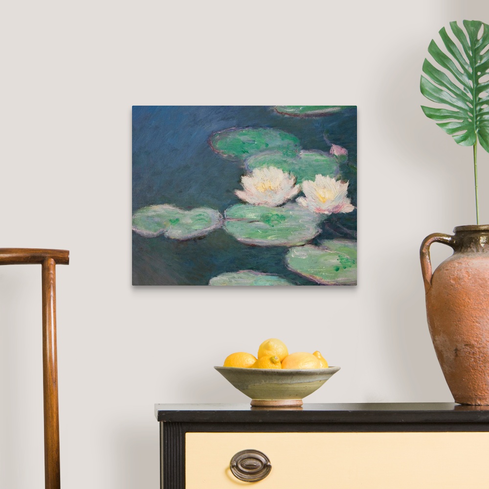 A traditional room featuring Huge classic art focuses on a group of lily pads sitting on a quiet body of water.