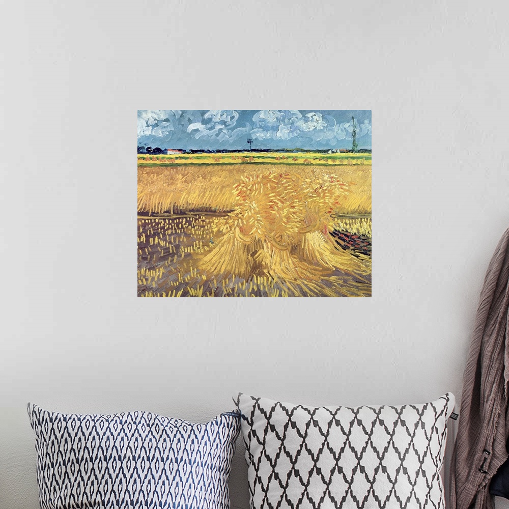 A bohemian room featuring Big, landscape classic painting of a golden wheat filed beneath a blue sky with billowing clouds,...
