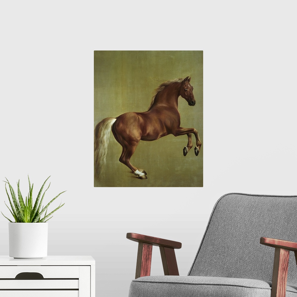 A modern room featuring Big classic art portrays a dark colored horse with its front hooves above the ground.  Artist pla...