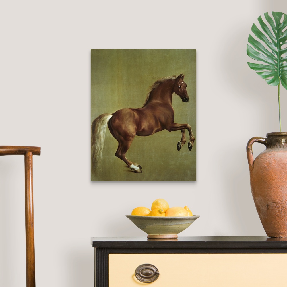 A traditional room featuring Big classic art portrays a dark colored horse with its front hooves above the ground.  Artist pla...