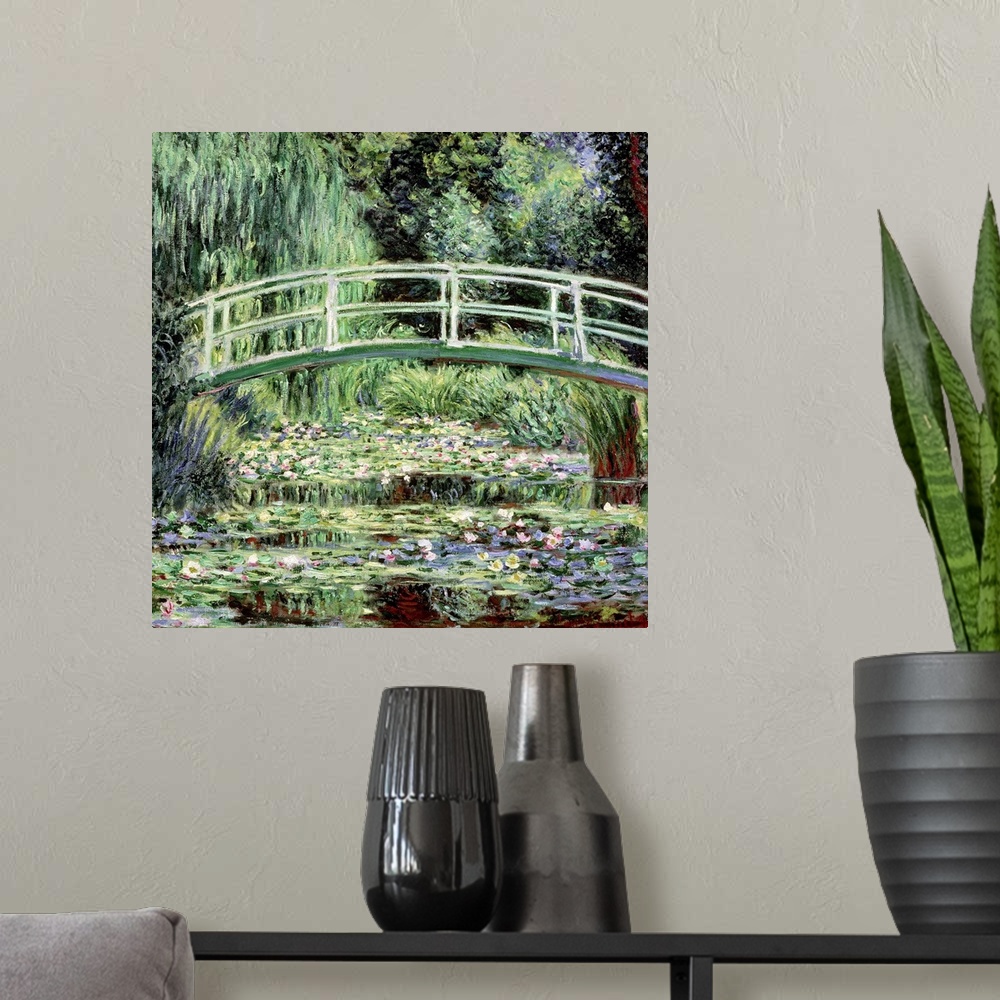 A modern room featuring Square artwork of an Impressionist painting of the garden at Givernyos landscape.