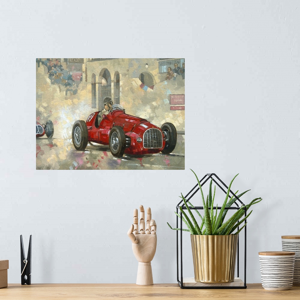 A bohemian room featuring Large artwork of a man driving by groups of people in a red race car with confetti falling from t...